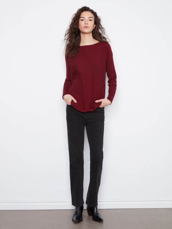 Stylish sweater with long ribbed sleeves, perfect for a cozy yet fashionable ensemble by Charlie B.