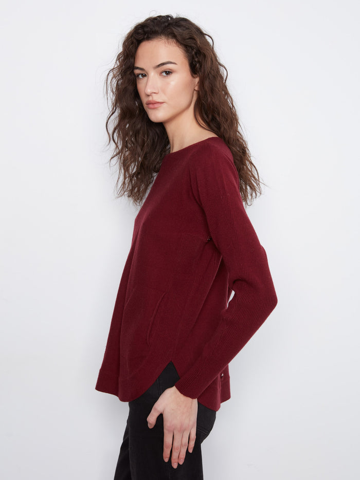 Sophisticated sweater highlighting a rounded hem for a modern touch to your outfit by Charlie B.