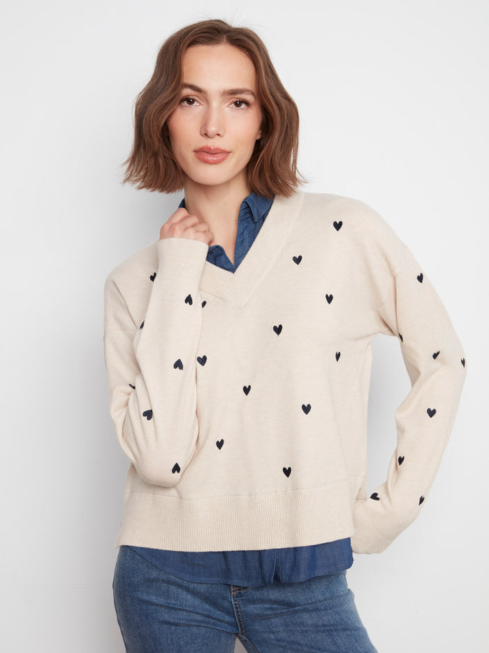 Heather Oat sweater with V-neckline and embroidered hearts, featuring a layered shirt collar by Charlie B.