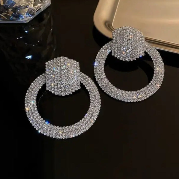 Liya Crystal Pavé Drop Hoop Earrings – Rhinestone Encrusted Hoops in silver | Zoha Los Angeles