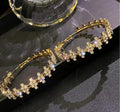 Lora Crystal Flower Hoop Earrings – CZ Floral Statement Hoops in Gold | Zoha Los Angeles
