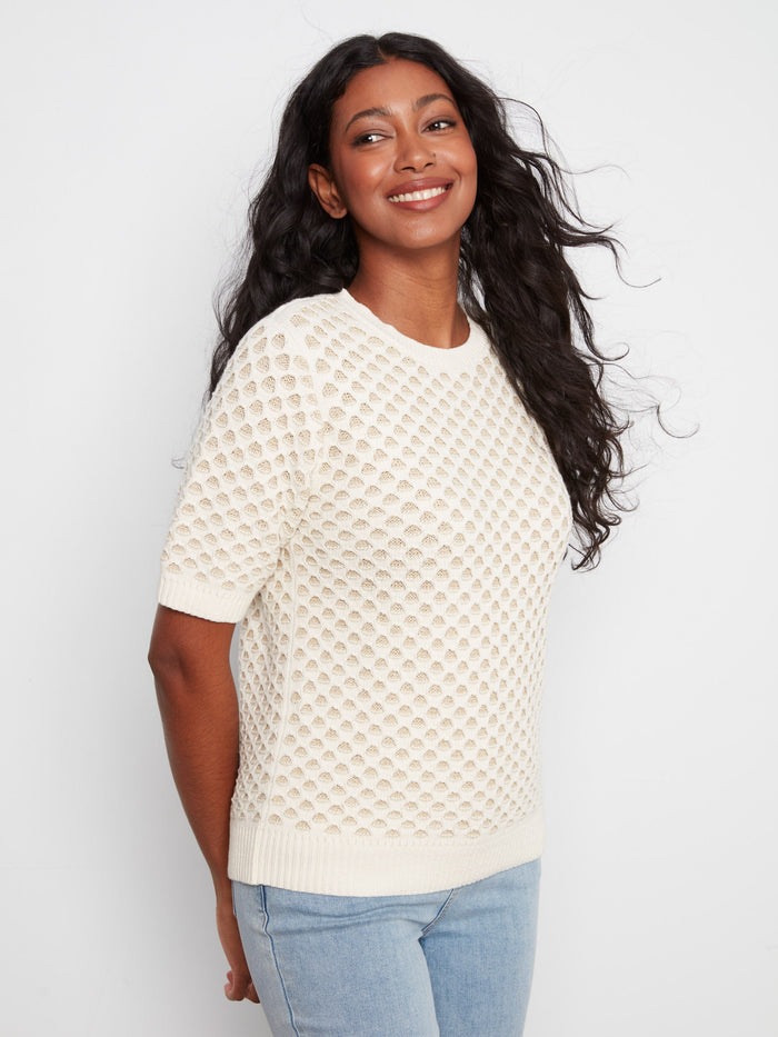 With its short sleeves, this piece offers comfort and style, ideal for layering or wearing on its own by Charlie B.