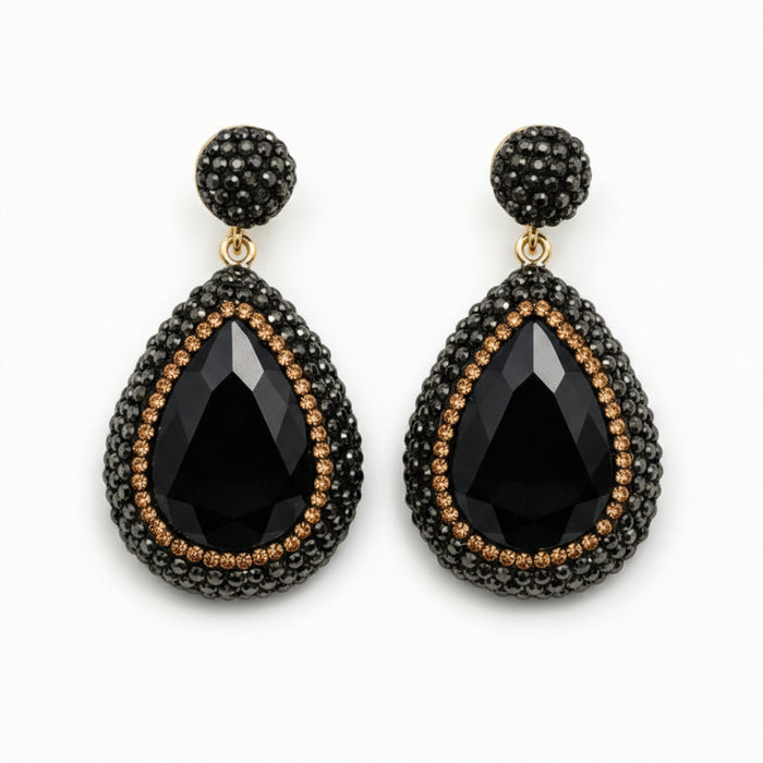 Mila black stone pendant earrings featuring large black crystals and rhinestones in a luxurious design.