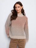 Stylish sweater featuring a mock neck design, perfect for adding a touch of elegance to your wardrobe. By Charlie B.