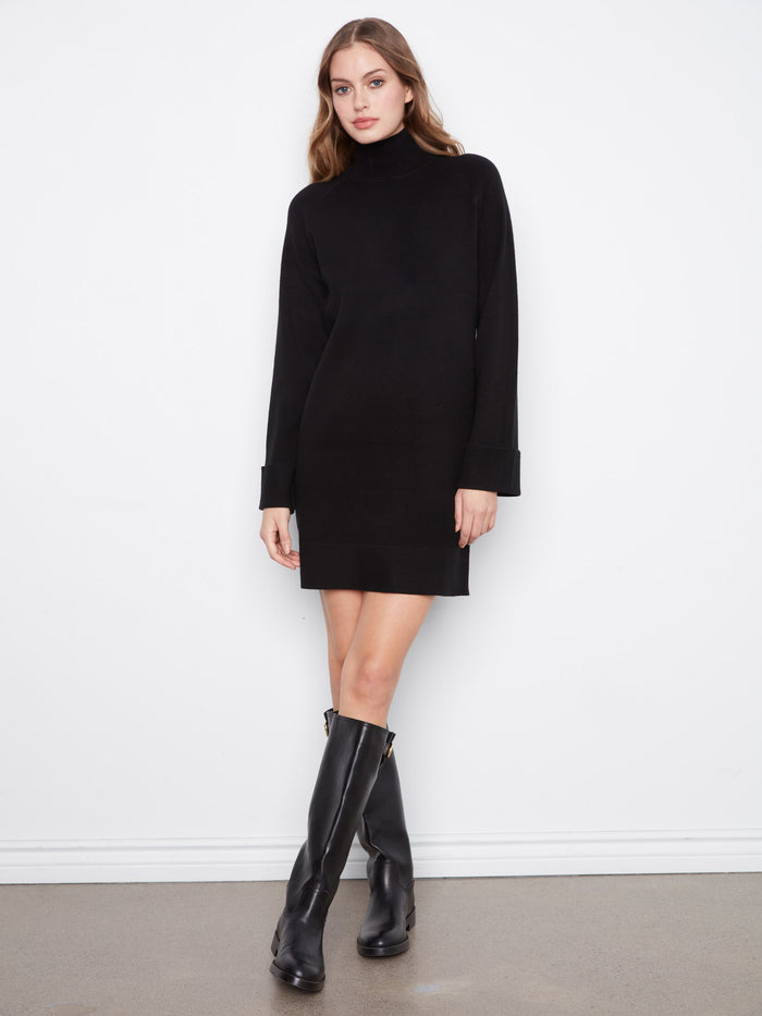 Elegant black sweater dress with mini length and long raglan sleeves, offering a chic silhouette by Charlie B.