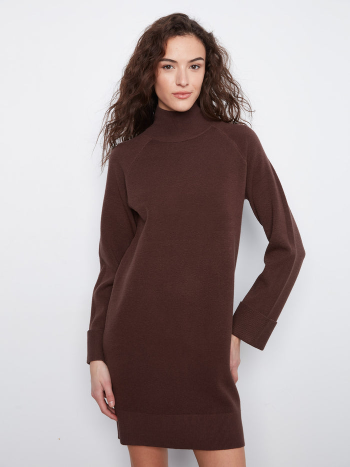This mini length dress offers long raglan sleeves for added sophistication by Charlie B.