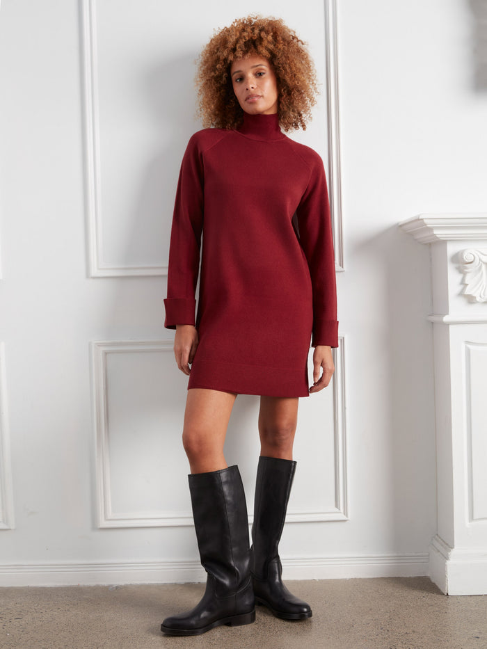 Stylish red dress showcasing a sleek silhouette, perfect for layering or wearing solo. Effortlessly chic and timeless by Charlie B.