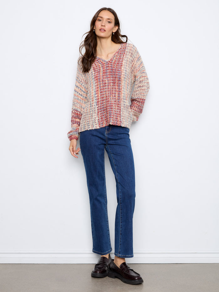 This cozy sweater showcases drop shoulders, adding to its relaxed and comfortable fit. By Charlie B.