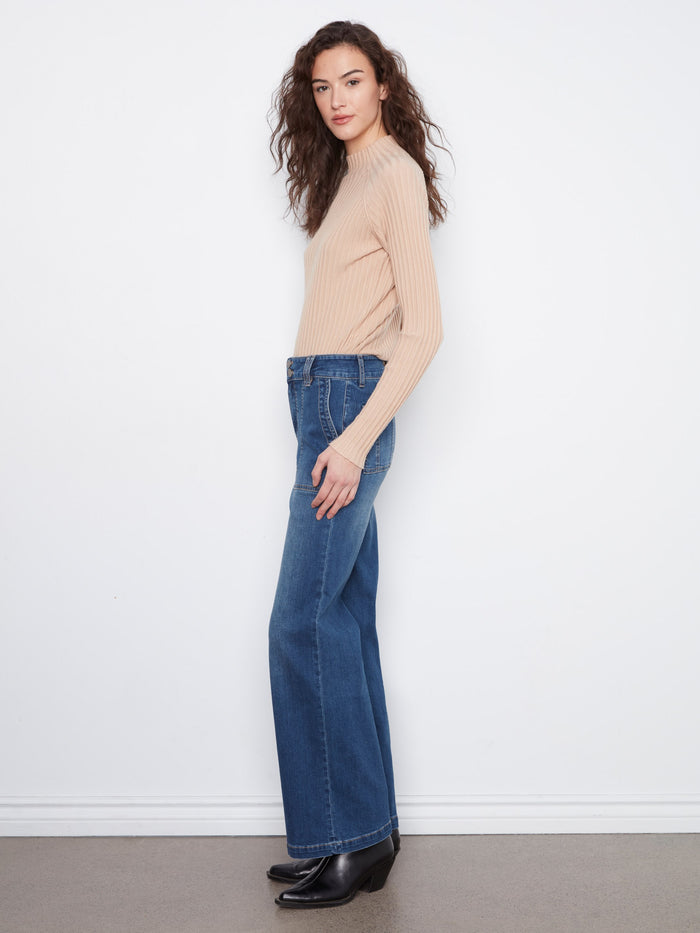 The double-button waistband adds a touch of elegance and functionality to these fashionable jeans by Charlie B.