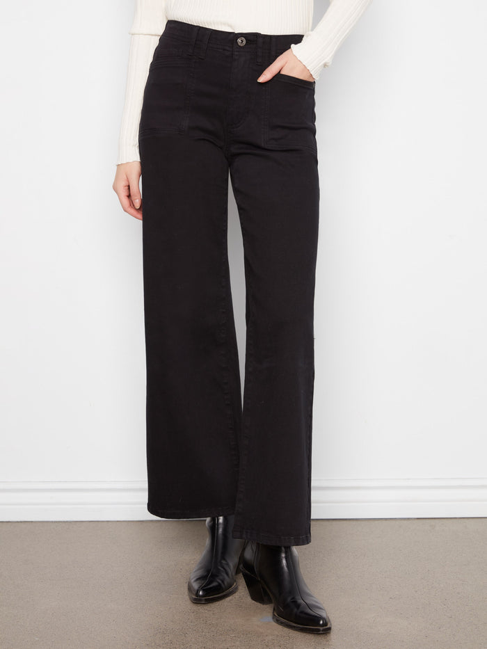 Comfortable stretch twill fabric in these black wide-leg pants, matched with stylish boots by Charlie B.