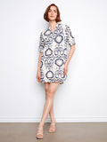 Patterned dress featuring a chest pocket, adding functionality and style to your wardrobe. Perfect for casual outings. By Charlie B.