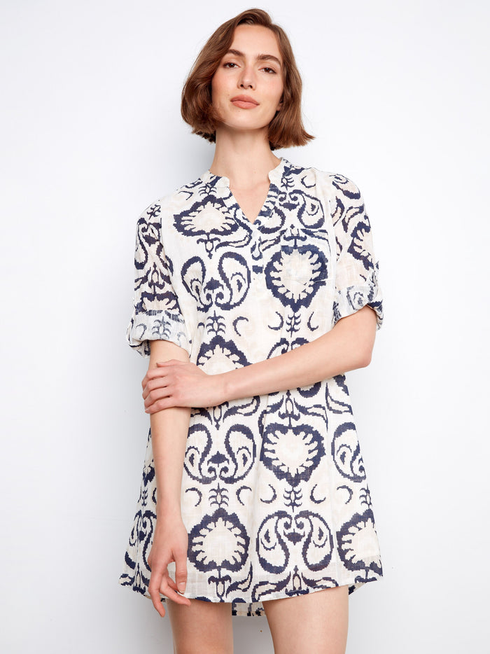 Chic dress featuring adjustable 3/4 sleeves, offering versatility and ease in styling your daily outfits. By Charlie B.