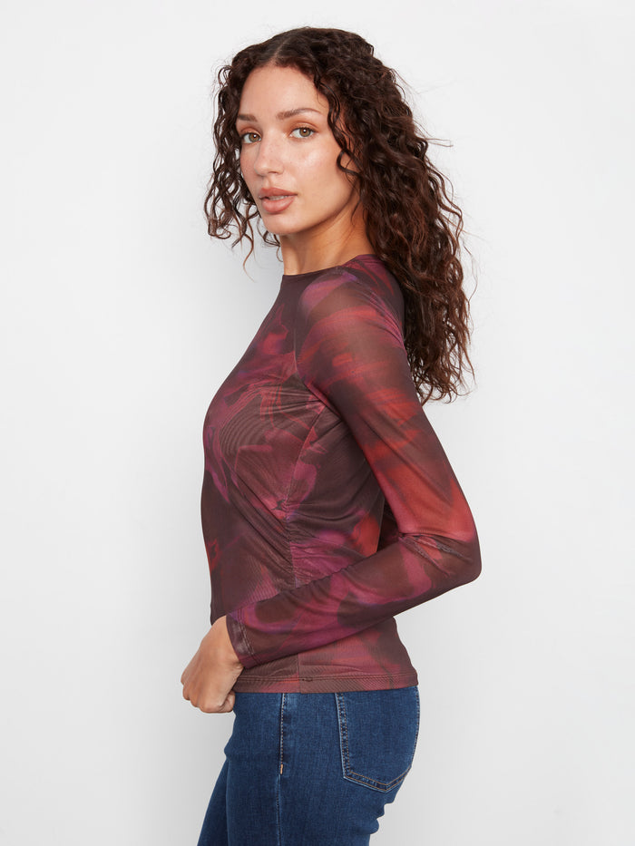 The body lined design of this top ensures comfort and style in every wear by Charlie B.