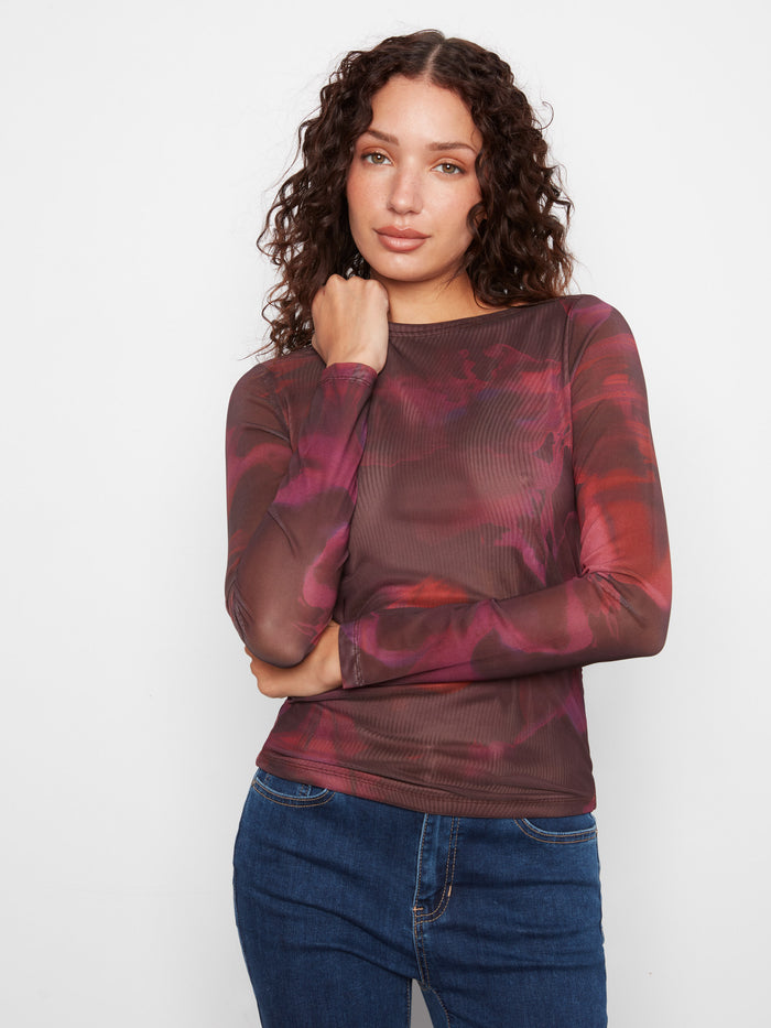 Embrace the elegance of long sleeves with this beautifully patterned top by Charlie B.