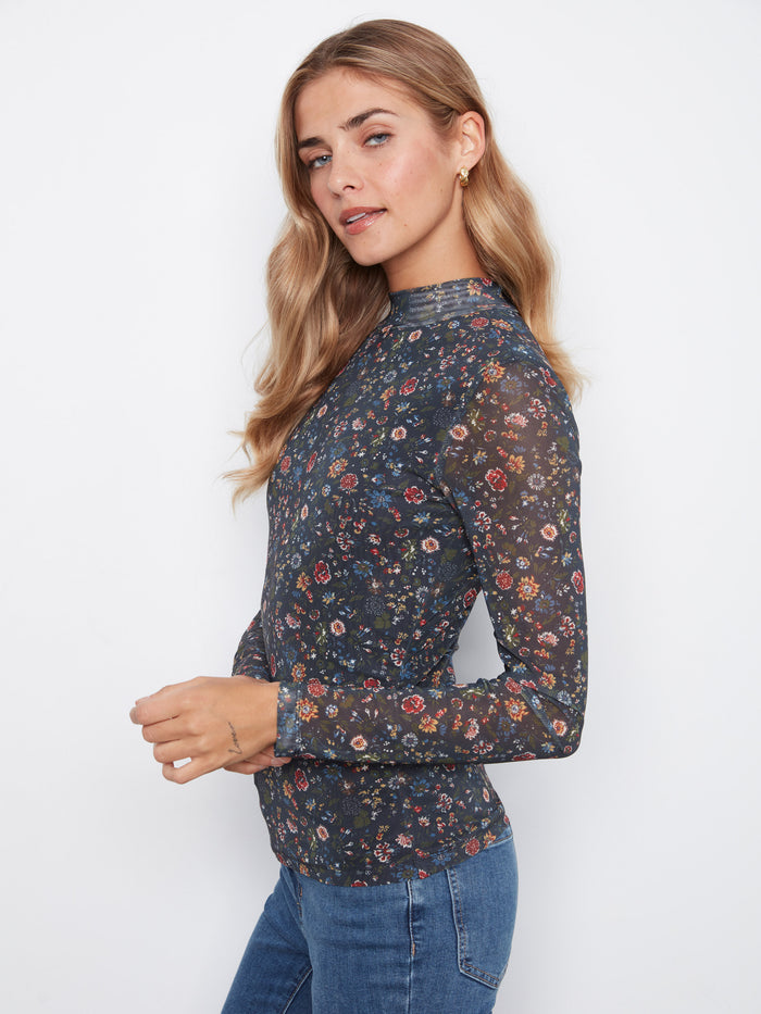 Chic floral top featuring body lined for coverage, ensuring both style and modesty by Charlie B.