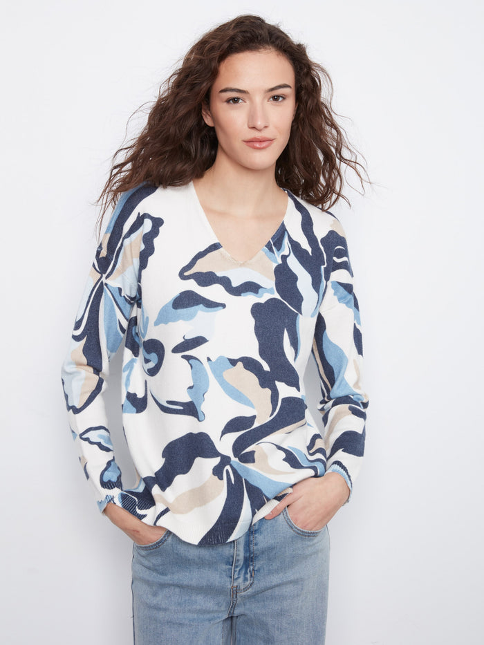 This V-neck sweater features a lively print and comfortable fit, making it a versatile addition to your wardrobe by Charlie B.