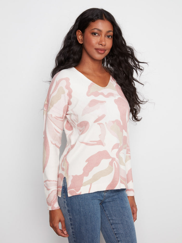 Designed with a drop shoulder style, this sweater adds a touch of relaxed sophistication to your wardrobe by Charlie B.