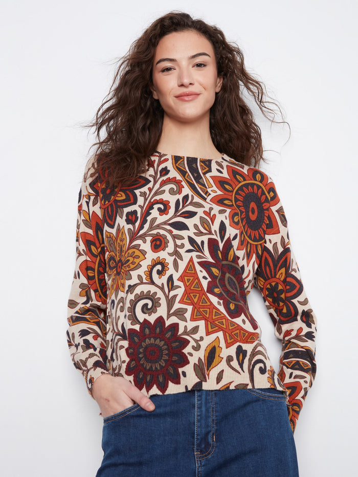 Floral-patterned sweater with a crew neck, perfect for casual outings. The intricate design adds a touch of elegance. By Charlie B.