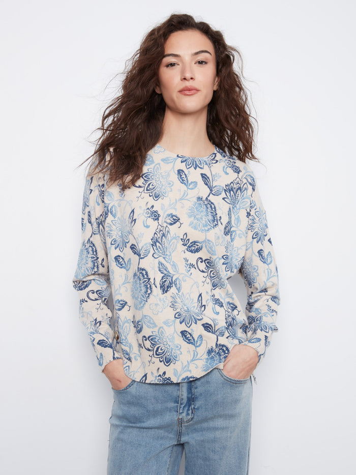 Floral top featuring a classic crew neck, perfect for casual outings. Crafted for comfort and style by Charlie B.