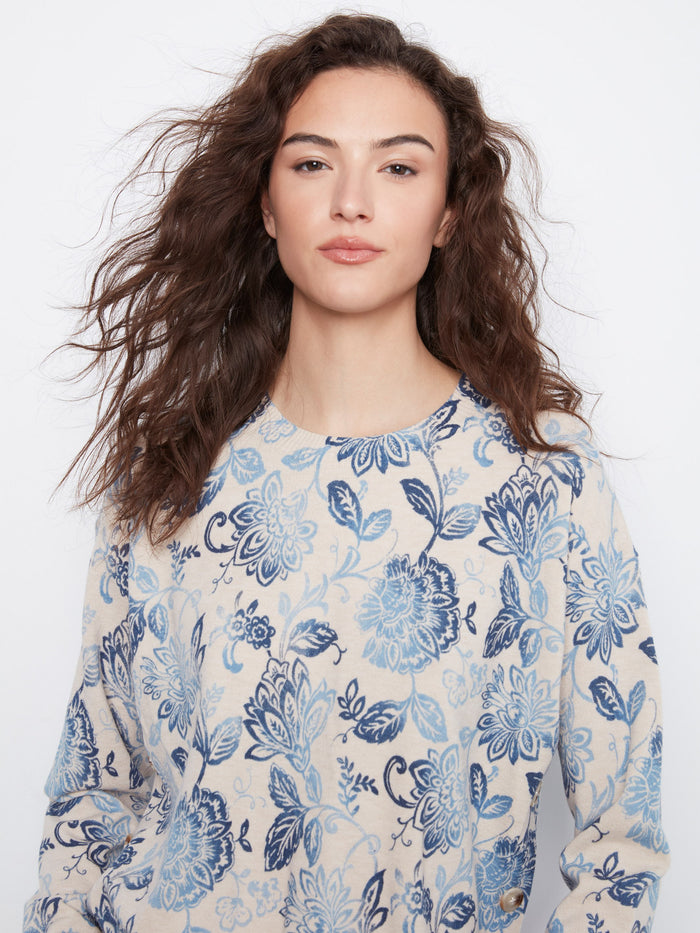 Stylish floral patterned top showcasing intricate details, perfect for any occasion. Created by Charlie B.