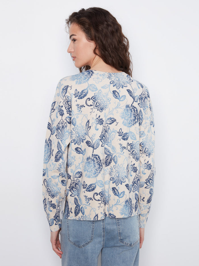 Beautifully crafted floral top designed to enhance your wardrobe with its unique style and quality. By Charlie B.