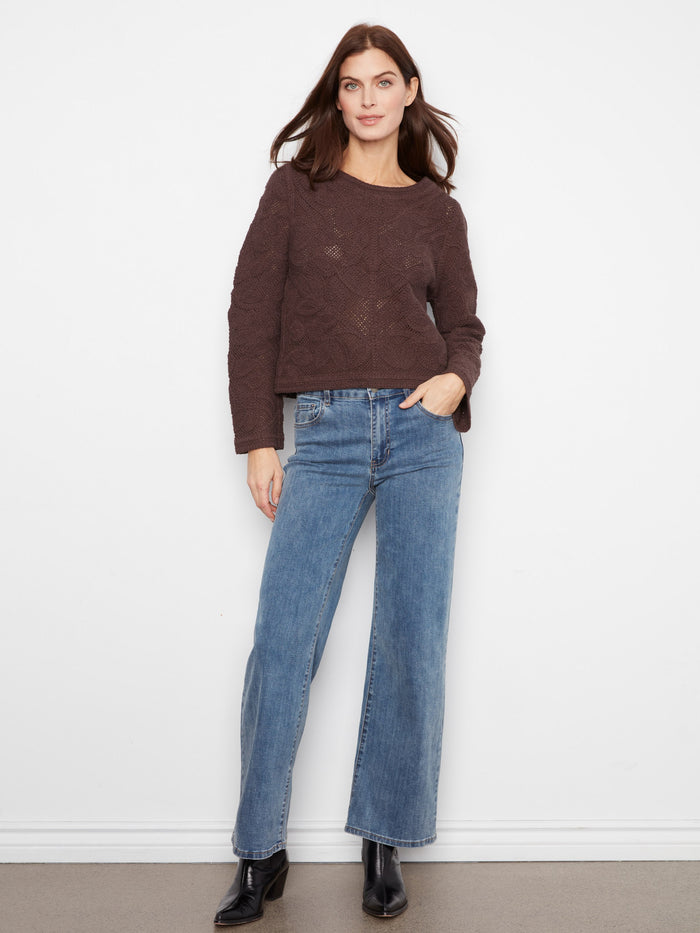 Experience warmth with long sleeves in this beautifully crafted cotton sweater, ideal for cooler days. By Charlie B.