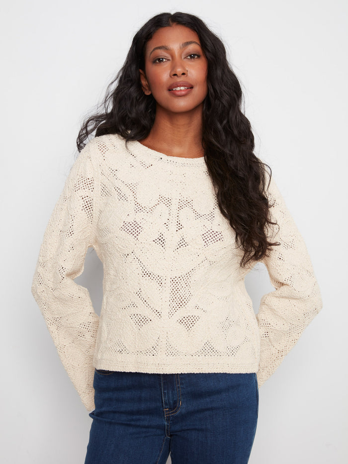 Natural crochet cardigan featuring a crew neckline, ideal for adding elegance to any outfit by Charlie B.