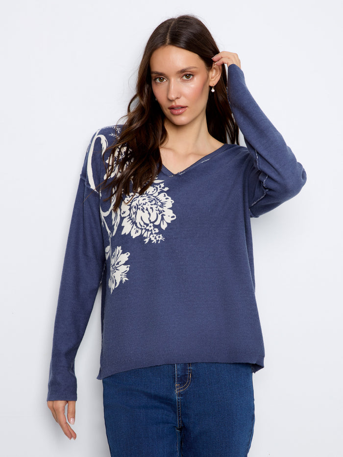 Enjoy the versatility of this reversible print sweater, perfect for varied looks. By Charlie B.