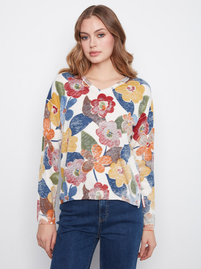 Floral sweater featuring a V-neck design, crafted from a soft cotton blend for comfort and style. Perfect for any casual outing by Charlie B.