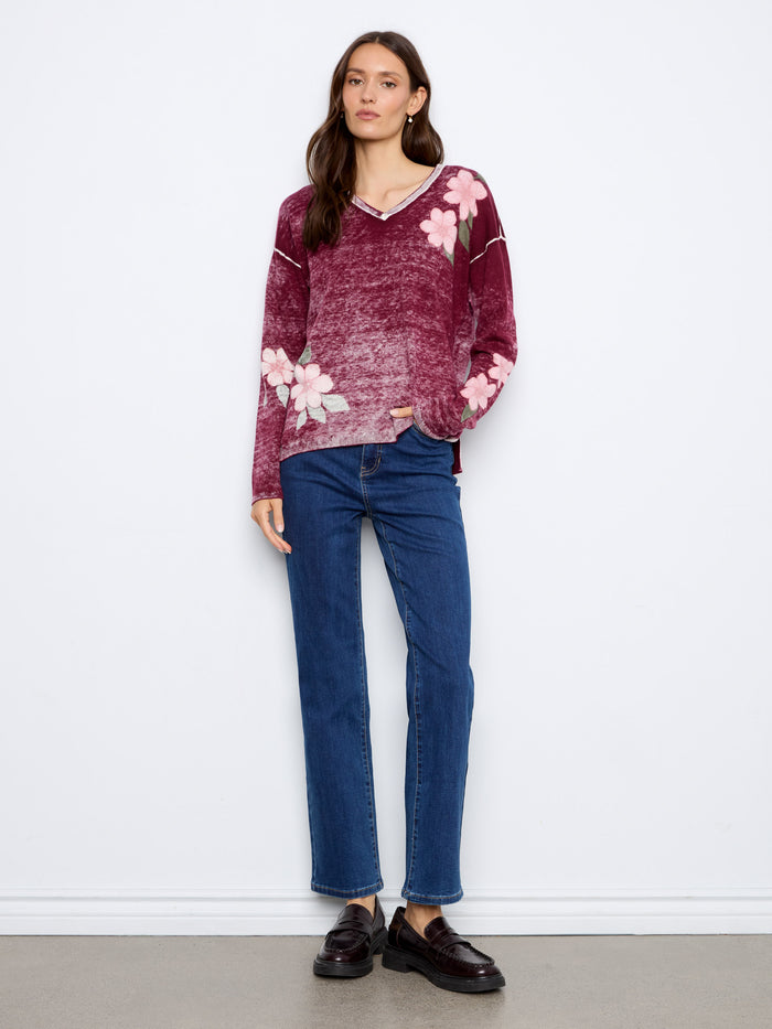 Cotton blend V-neck sweater featuring vibrant floral print, offering comfort and style by Charlie B.