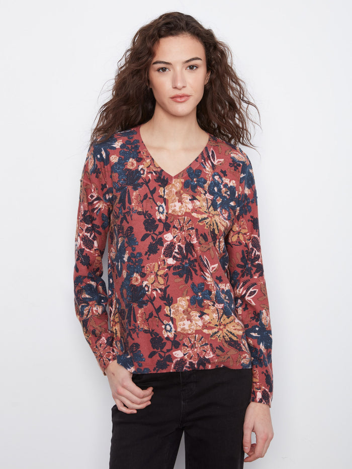 Floral V-neck top featuring a reversible print, perfect for versatile styling. Crafted from a comfortable cotton blend by Charlie B.