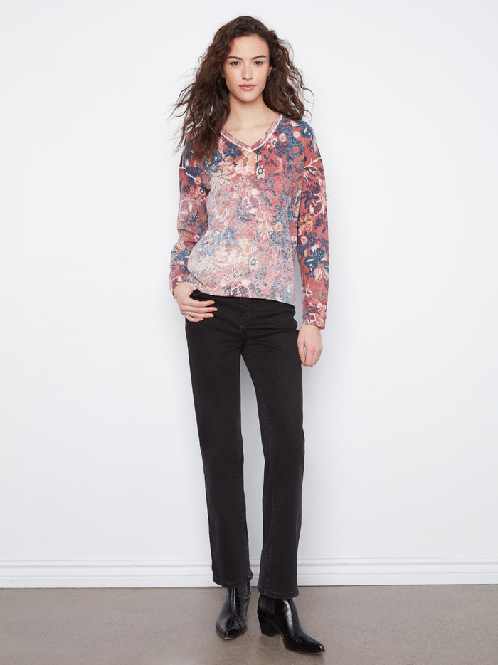 Chic reversible print top showcasing vibrant florals, easily adaptable to different looks. Soft cotton blend material by Charlie B.