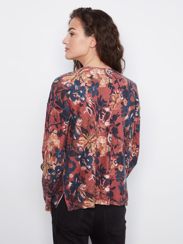 Beautifully crafted floral top with long sleeves and drop shoulders, providing both style and ease of movement by Charlie B.