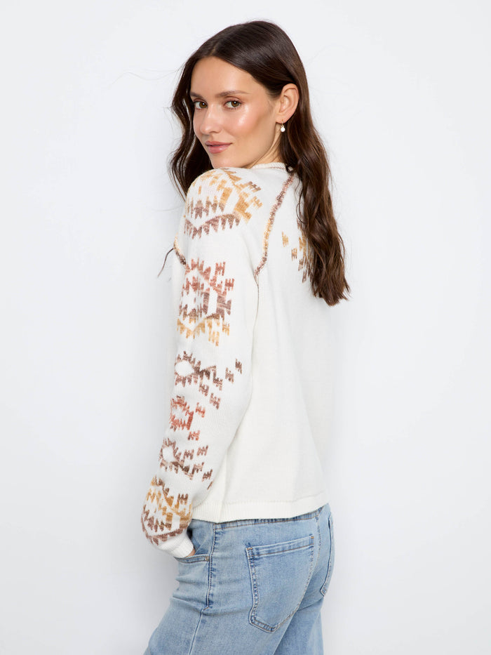 A crew neckline complements the intricate pattern on this comfortable and stylish garment. By Charlie B.