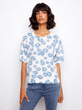 Floral print top in 100% cotton, featuring a classic crew neckline. Perfect for casual outings or layering. By Charlie B.