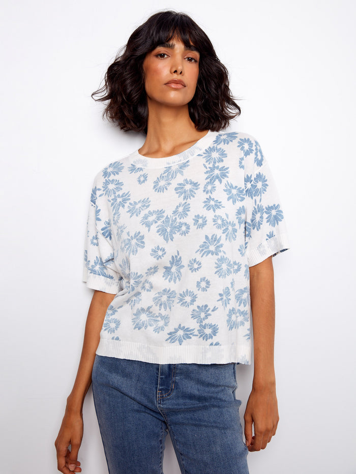 This short sleeve top offers a reversible design, adding versatility to your wardrobe. Made with comfort in mind. By Charlie B.