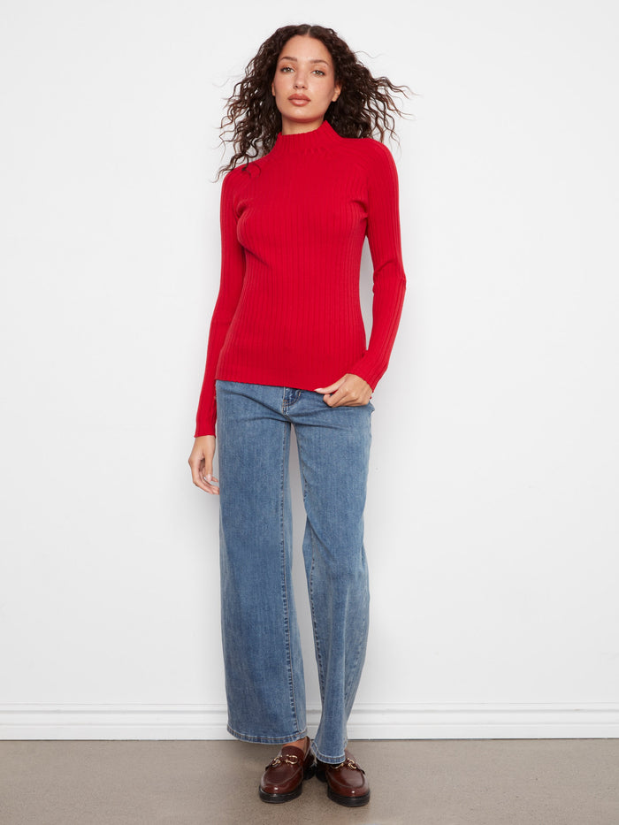 Chic long sleeves add sophistication to this ribbed knit red sweater, making it a versatile piece for any wardrobe by Charlie B.