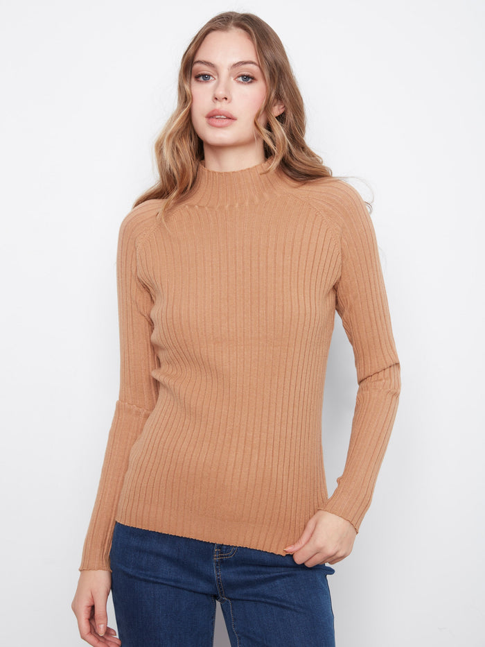 Elegant ribbed knit sweater with a cozy mock neck, perfect for chilly days. Crafted for style and comfort by Charlie B.