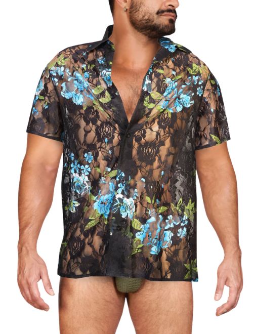Man wearing a sheer floral lace shirt with a white background