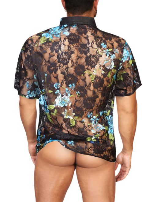 Man wearing a sheer floral lace shirt on a white background