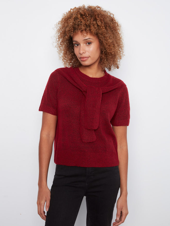 Elegant top with a crew neckline, showcasing its chic style by Charlie B.