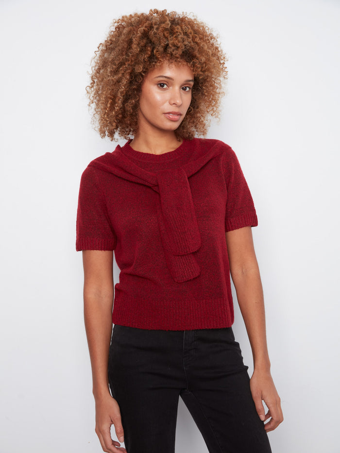 Featuring an attached sweater detail for added flair and warmth by Charlie B.
