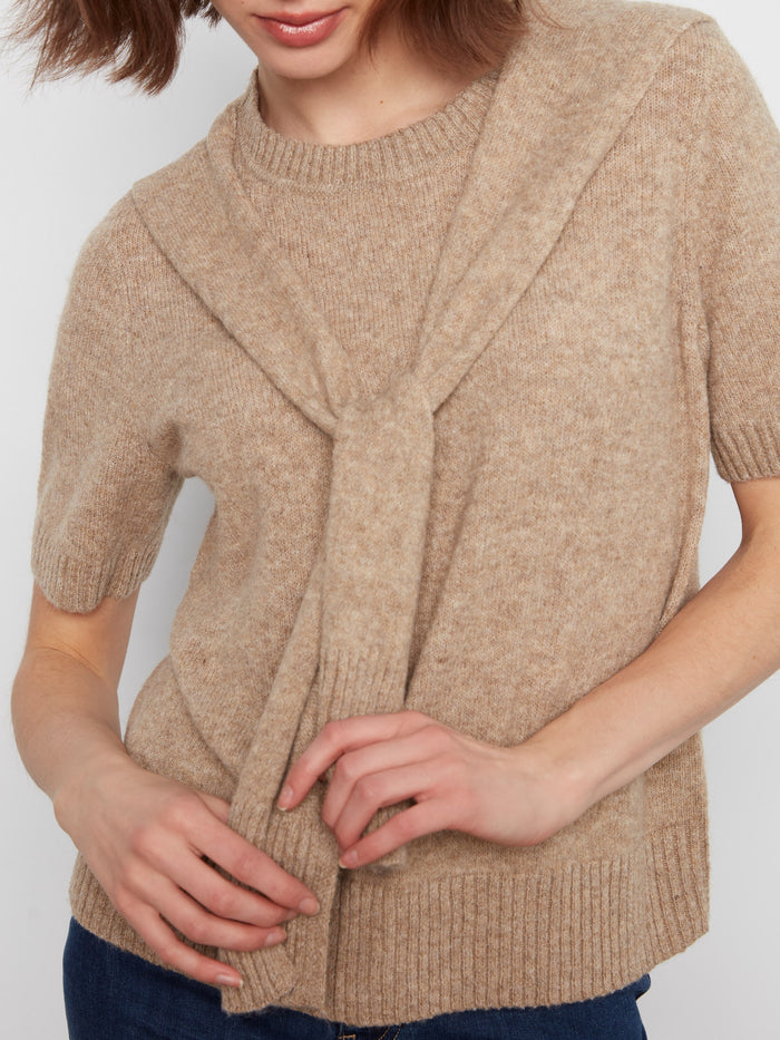 Chic short sleeves add a stylish touch to this soft knit sweater, perfect for any casual occasion. By Charlie B.