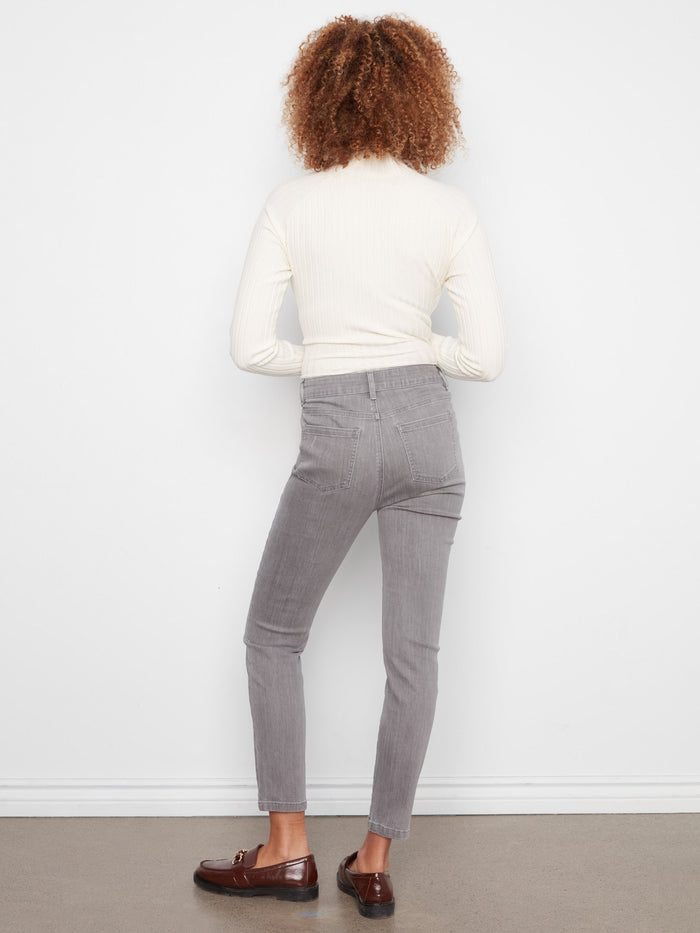 Smoke grey slim leg jeans offering a chic cropped length, designed with stretch denim for flexibility by Charlie B.