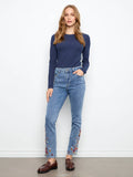 Medium blue jeans with stretch denim, featuring floral embroidery and a five-pocket style by Charlie B.