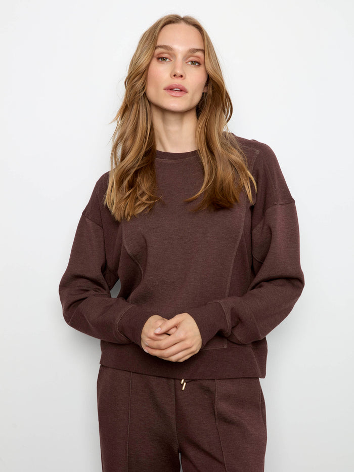Espresso-colored sweatshirt showcasing a relaxed fit and comfortable design by Charlie B.
