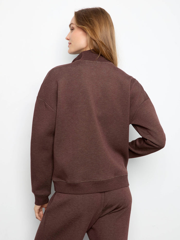 Relaxed fit ensures ease of movement and casual elegance by Charlie B.