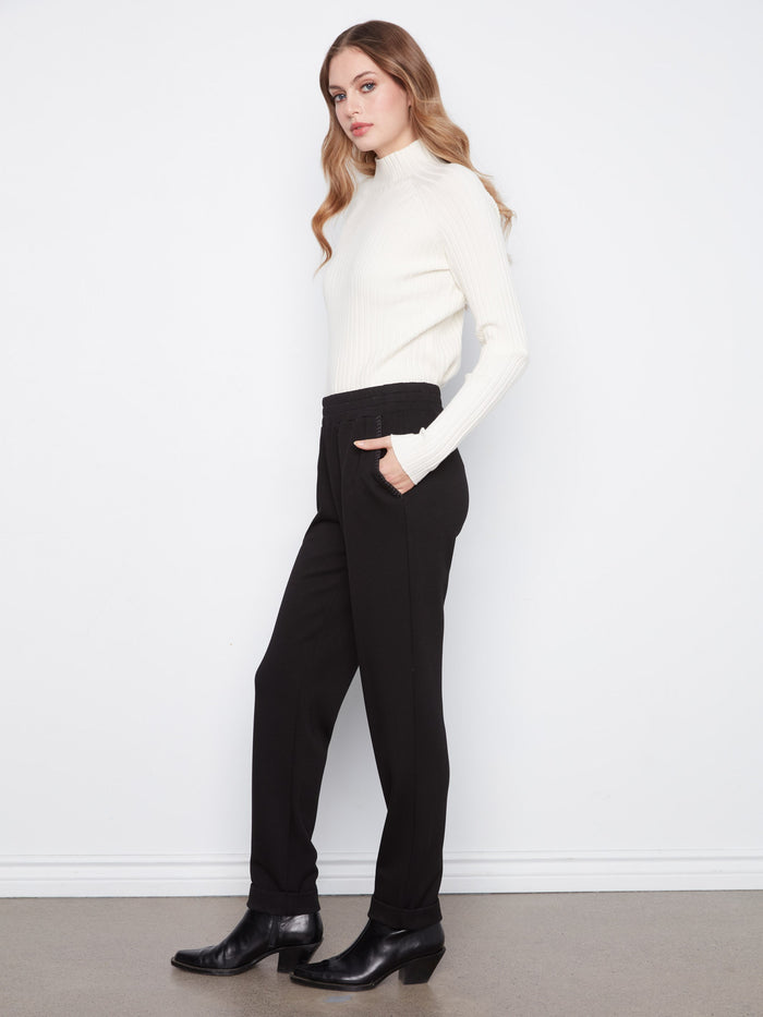 Designed with slash pockets, these pants combine style and practicality seamlessly by Charlie B.