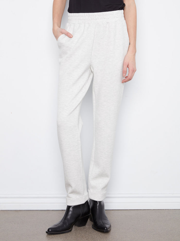 These jogger pants in heather-light grey offer a full-length design with convenient slash pockets, ideal for everyday style by Charlie B.