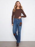 Regular rise jeans with eye-catching corduroy heart patches bring a unique flair to classic denim. Comfortable fit by Charlie B.